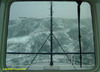Ship facing large wave